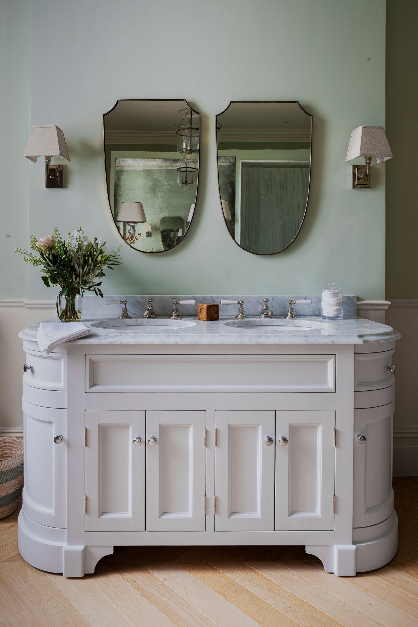 Cashmere Chevron Caroline Riddell project with white cabinet, green walls and mirror