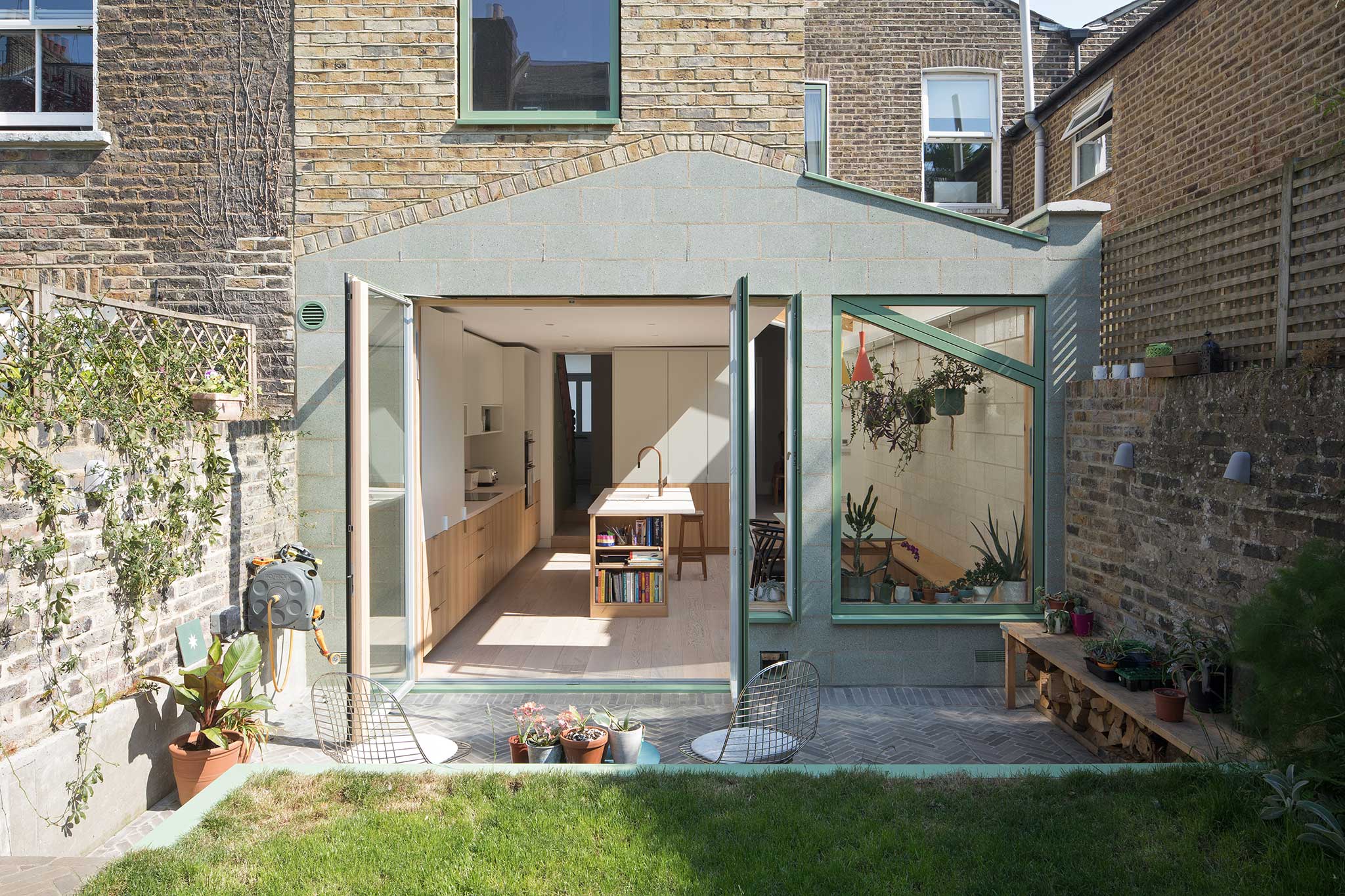 The Green House featuring Hollington Extra Wide Plank. Exterior Shot of house from garden